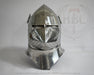 A polished steel medieval helmet with a pointed visor and side guards, photographed against a light gray background with a faint HBC armor watermark.