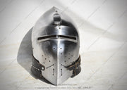 A hand-forged 14th century Klappvisor Bascinet garlic head helmet with an openable visor, featuring a buff polished finish and quadrangular sight holes.