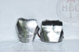 A pair of metallic steel breastplates or armor plates displayed side-by-side against a white backdrop with a faint HBC Armor Shop watermark.